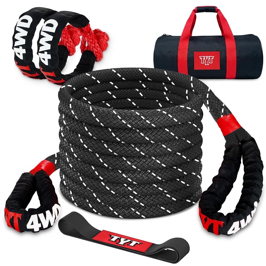 Black TYT kinetic recovery rope, 1 inch by 30 feet, coiled with two soft shackles.