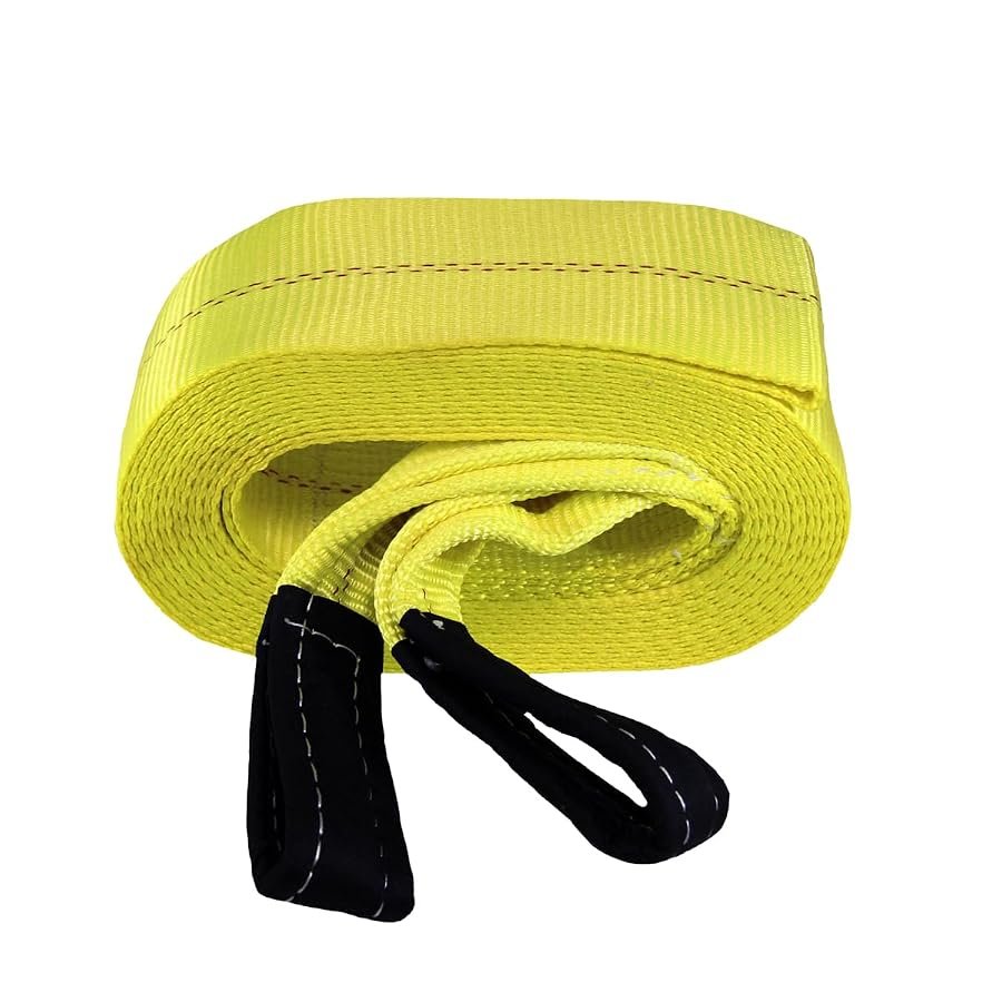 Grip heavy duty tow strap, 30 feet long and 4 inches wide, coiled.